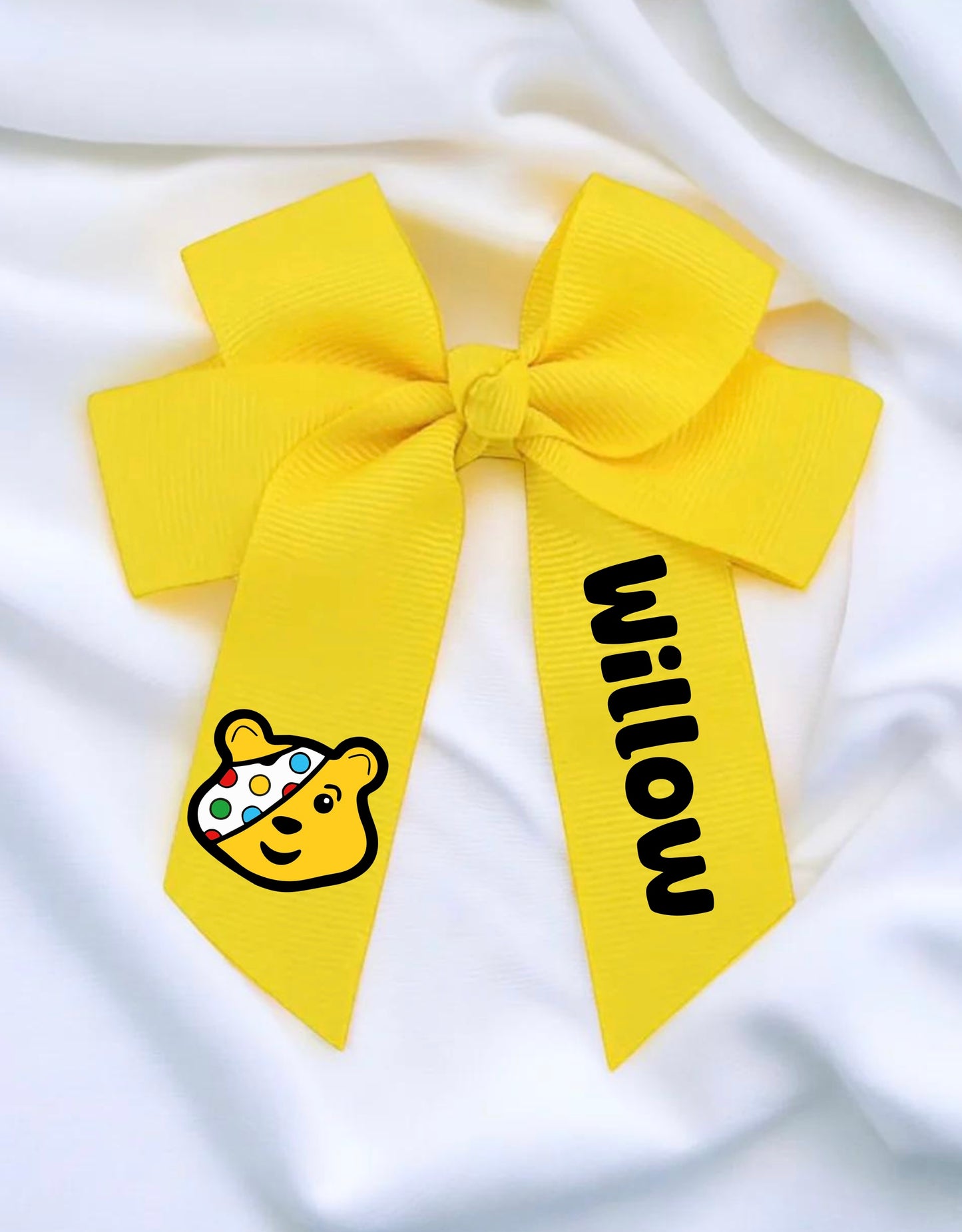 Yellow children in need bow